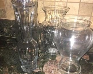 Item #5:  Set of 4 medium-size glass vases.  Assorted heights.  $10