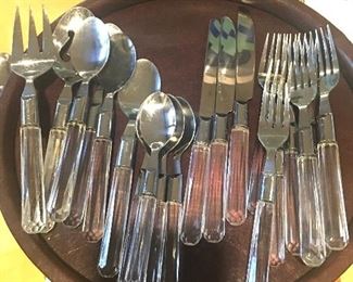 Item #11:  Place setting for 4 (but only 3 knives) of clear-handled silverware:  $10