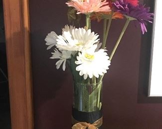Item #14:  Vase with assorted-colored daisies (vase is approx. 11" tall).  $10