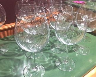 Item #49:  Set of 11 beveled-design wine glasses $15