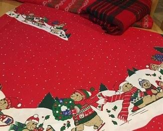 Item #64:  Set of three Christmas tablecloths: $15
