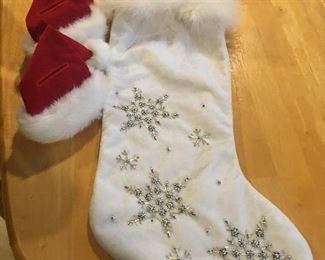 Item #66:  Christmas stocking with two silverware-holder Christmans hats:  $10