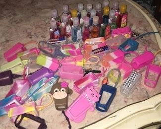 Item #73:  Assorted petite hand sanitizer (not all are full) w/assorted holders: $20