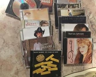 Item #551:  Assorted country CDs (14 CDs): $20