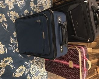 Item #76:  Lot of 3 suitcases ((1) Justice/leather-(2) fabric:  $30