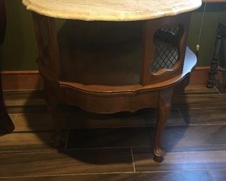 Item # 83: Round end table with marble top (28" rd) $60