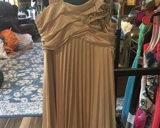 Itme #130:  Girls special gold special occasion dress. Size 12: $15