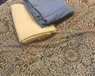 Item #105:  Set of three tablecloths (1=round/66") (2=54"x120"): $15