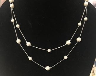 Item #561:  Double layer faux pearls (18"): $10