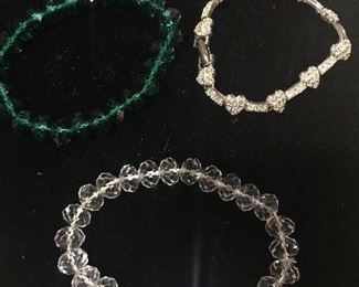 Item #565:  Set of three beaded/rhinestone bracelets: $12
