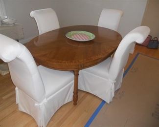 Table has sold, chairs still available. 