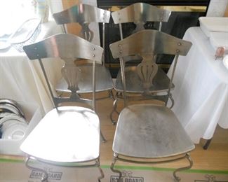 4 UNIQUE METAL CHAIRS
