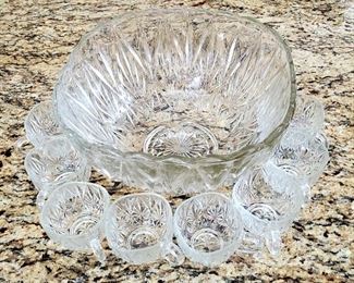 Glass punch bowl and 8 cups. $25.