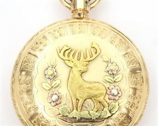 An American Waltham Watch Company 14k Multi-color Gold pocket watch. 18 size, 15 j, Adjjusted 3 pos, DMK, SW, LS, in a 14k  Gold fancy engraved with Stag on rear cover HC, SSD w/Roman numerals.  Serial # 3362013.   Slight wear, short hairline in dial, winds, sets and running when cataloged. ESTIMATE $1,500-2,500