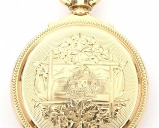 An Elgin National Watch Company "G. M. Wheeler" model 14k Gold pocket watch. 18 size, 15 j, SW, LS, in an 14k Gold fancy engraved with boxed hinges HC, SSD w/Roman numerals.  Serial # 1774197.  Very slight wear, short hairline in dial, winds, sets and running when cataloged. ESTIMATE $1,500-2,500