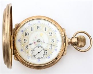 An Elgin National Watch Company 18k Gold pocket watch. 16 size, 15 j, SW, LS, in an 18k Gold fancy engraved hunter case with boxed hinges, Extra Fancy SSD w/Arabic numerals.  Serial # 4691809.    Some wear, minor denting, stem loose, winds, sets and running when cataloged. ESTIMATE $1,000-2,000