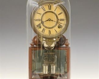 A late 19th century Ansonia "Crystal Palace No. 2" parlor clock.  8-day time and strike movement with papered dial and Roman numerals.  Walnut case with lower mirrors and turned base under a glass dome.  Old finish with some wear, brass tarnished, running when cataloged.  17 3/4" high overall.  ESTIMATE $300-400
