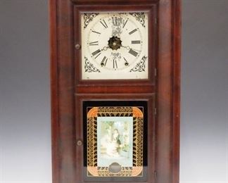 A late 19th century Waterbury OGEE shelf clock.  8-day weight driven time and strike movement with painted metal dial.  Mahogany two door case with reverse painted tablet.  Original dark finish with some wear, flaking on dial, modern weights, running when cataloged.  30" high.  ESTIMATE $200-300