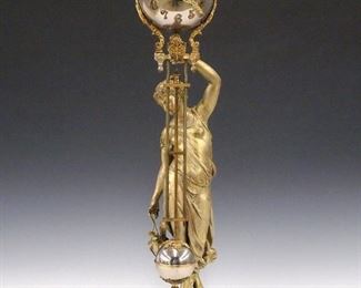 A turn of the century Ansonia "Huntress" model figural swinger clock.  8-day time only movement with ball top and grid iron pendulum.  Cast Spelter case with figure of a "Huntress" on a Black base.  Repainted with some wear, running when cataloged.  24 1/2" high.   ESTIMATE $600-800