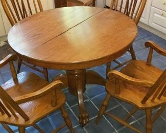 #348 round kitchen table and chairs 42 inch diameter 29 high, chairs 20 1/2 wide x 41 tall.. sturdy set $85