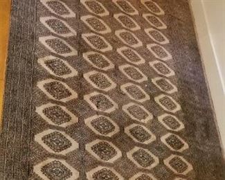 #328  Bokara  rug Pakistan origin hand knotted some damage in middle as shown in pics. hard to get the whole rug in one picture with small rooms and ceilings ..120-98 inches  $350