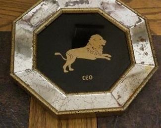 #309 8.25 inch diameter vintage leo sign $15