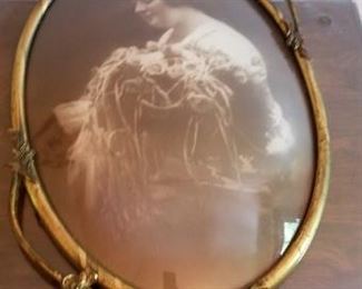 #307 antique photo of woman oval glass bubble with metal frame 24 tall 14 wide $60