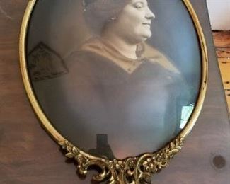 #306 antique photo of woman oval glass bubble with metal frame frame 21 x 11 wide $50