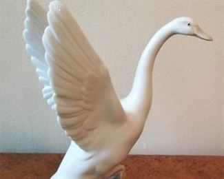 #107 lladro goose 9 inches tall $25