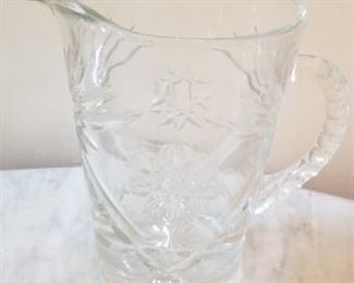 #79 cut glass pitcher 9 tall 7 diameter $10