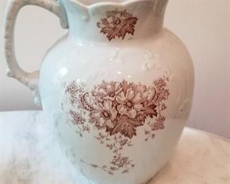 #48 royal england pitcher 12 inches tall small chip visible in pic. $5
