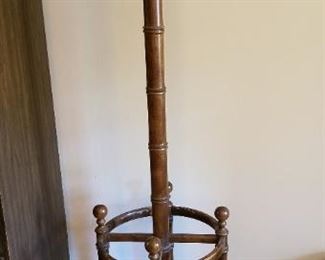 # 6 hall tree with umbrella stand on bottom 74 tall with 16 inch diameter. $25