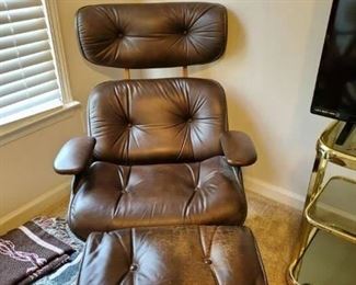 Mid century leather button tufted lounge chair. Charlton manufacturer.