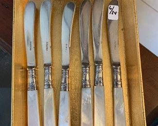 6 Sterling Mother of Pearl knives  $6/24.00      Gold tray  $8.00