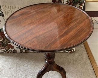 Round Cherry wood side table 23"h X 17"rd.  $58.