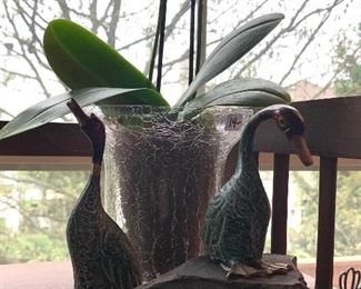 Pr. of Metal ducks   - rock sold separately $3.00   Orchid and glass pot  $14.00