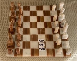 Onyx chess game  8" X 8"  $28.00  (one piece missing, we're looking for it)