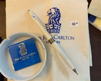 The Ritz Carlton napkin  $10.   Pen,  Ash Tray and Matches 