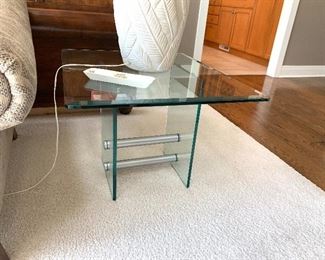 1 of 2 Glass end tables 28" X 24"  $140. each  w/matching coffee table