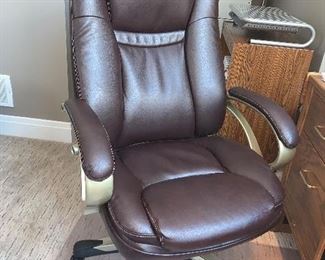 Rolling & swivel Faux leather office chair  $100.