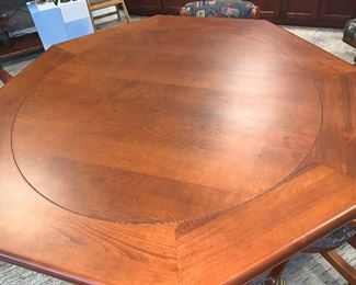 Flip top game table w/6 swivel chairs  $1140.