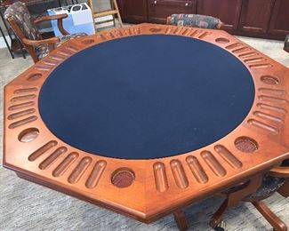Flip top game table w/6 swivel chairs  $1140.