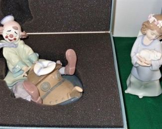 L30  (left) Lladro (Privilege) figure - clown on boat  (mint in box) $54.  SOLD               L31  (right) Lladro figure - angel with bunny  $44.
