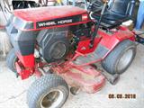 1999  314 - 8  Toro Wheel horse lawn tractor w. tiller, 42" deck, blower, chains & wheel weights