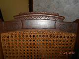 Carved caned rocker