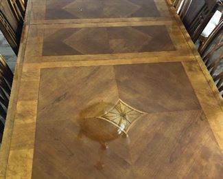 Dining room table with six chairs. Comes with two leaves and table Pads