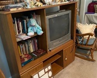 TV cabinet and books
