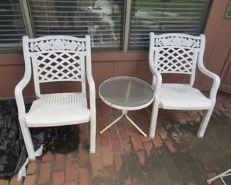2 Plastic chairs and round table- Price $25.00
