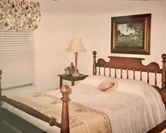 Early Colonial-American style headboard and footboard bed. Bedding will be sold as well. (The bed has a matching dresser/mirror. The bed, dresser/mirror can be bought as a set or separately. First offer, first serve.)