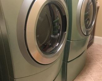 Whirlpool Duet front load washer and dryer on stands